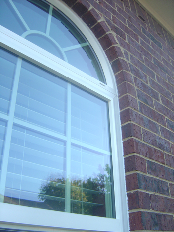 Simulated divided lite grids on vinyl replacement windows