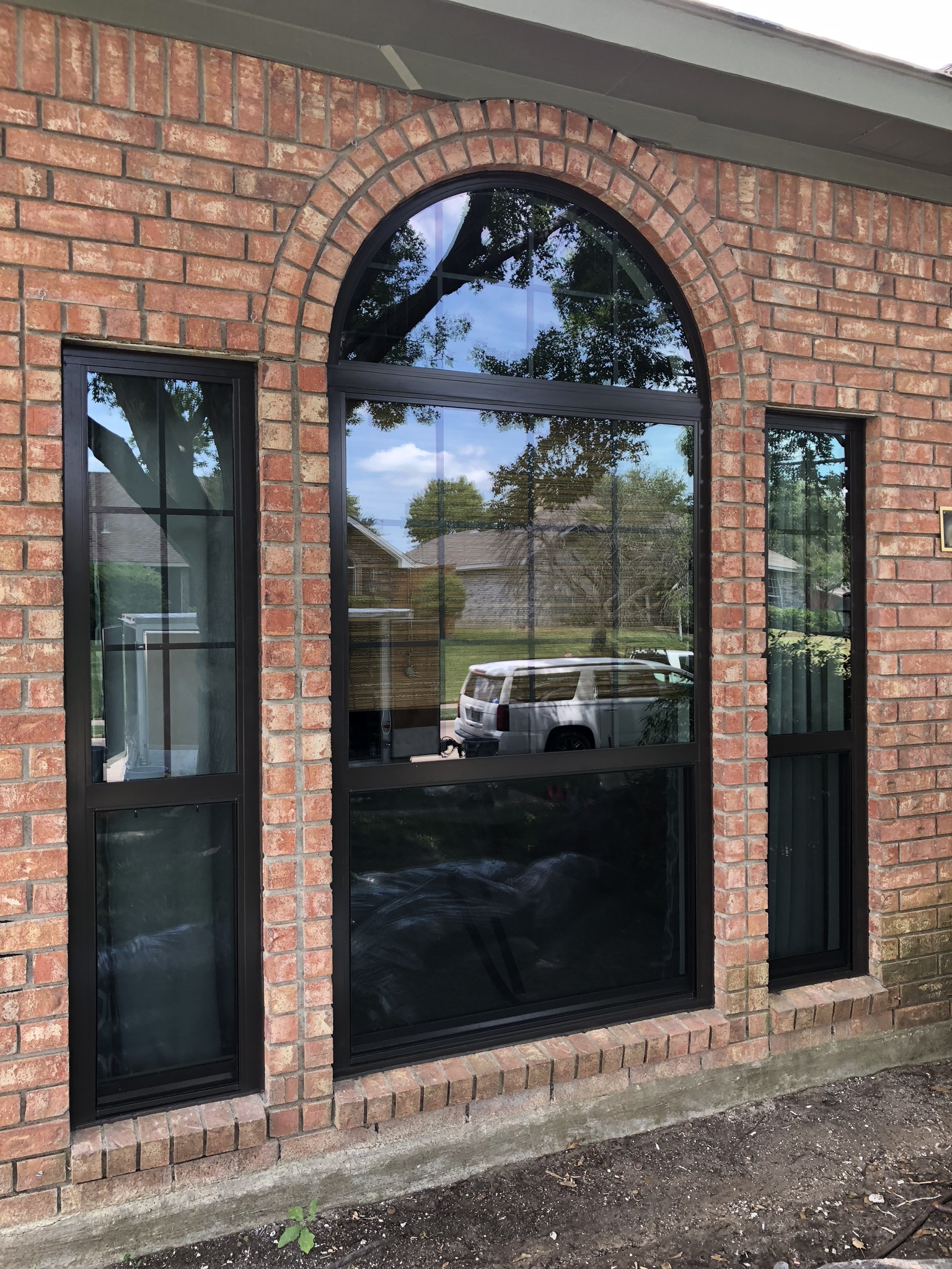 Don Young Company Aluminum Thermal Break Replacement Windows in Bronze Color