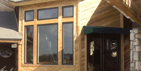 Cedar Trimmed Marvin Wood Windows at the Tropphy Club Texas overlooking the 9th green