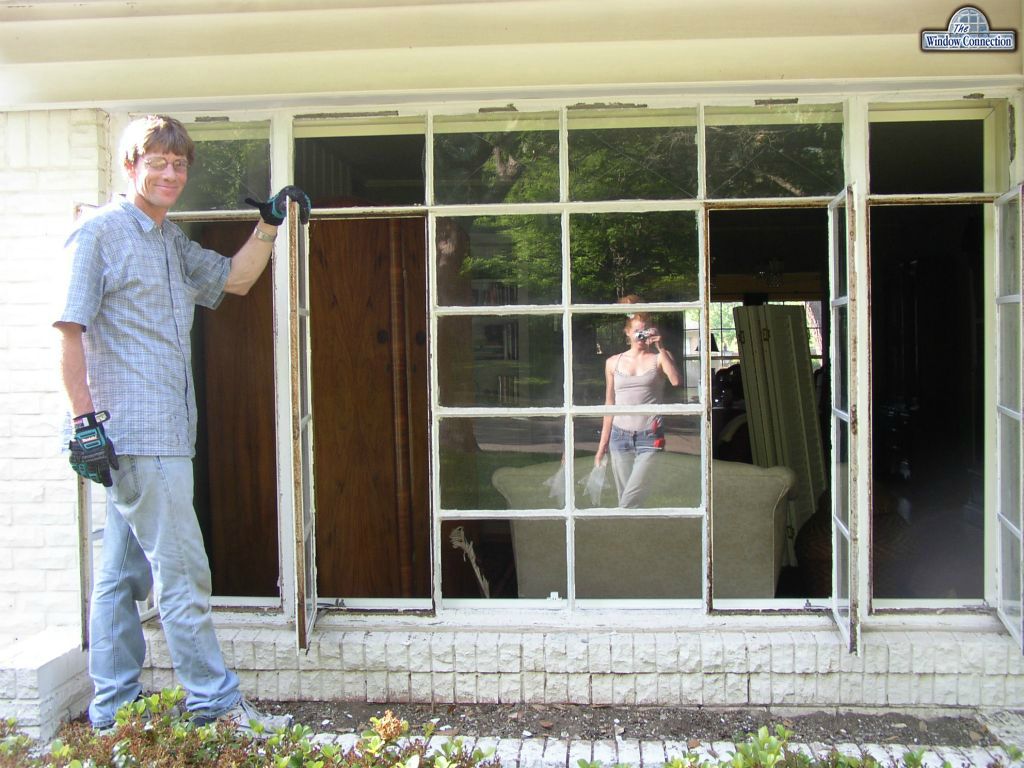 A window installation from 2004 with my lovely bride in the reflection