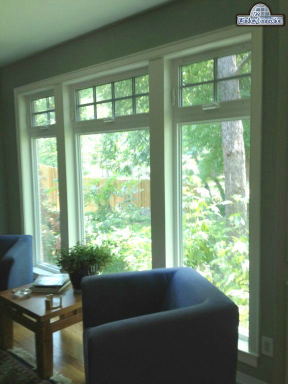 Awning Windows With Simulated Divided Lite Grids Over Picture Windows in Ponder