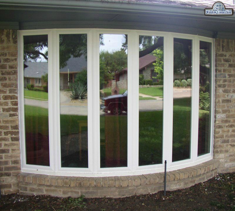 Bow Window in Dallas with Cheaper Model Vinyl Replacement Windows.  I did this one for a house flipper on the economy budget.  It shows I think that you don't get the same look from cheap windows that you do from good ones.