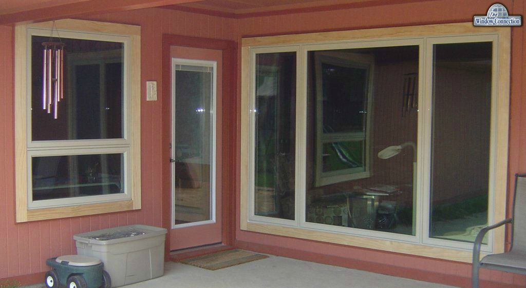 Three Lite Casements and Awning Style Windows in Beige