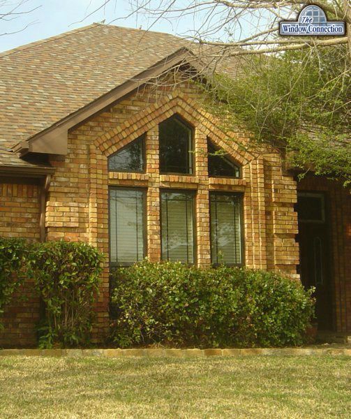 Don Young Thermally Broken Aluminum Single Hung Replacement Windows in Bronze With Prarie Lite Grids  in Dallas Texas