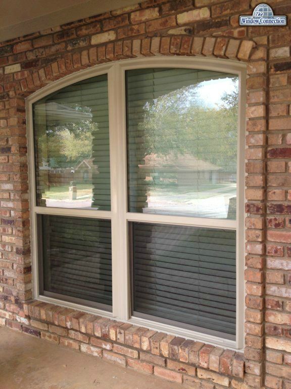 Twin Eyebrow Circle Vinyl Replacement Windows from NT Window - Energy Master